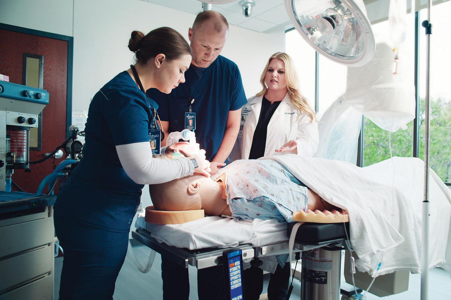 Students practicing skills in the OR